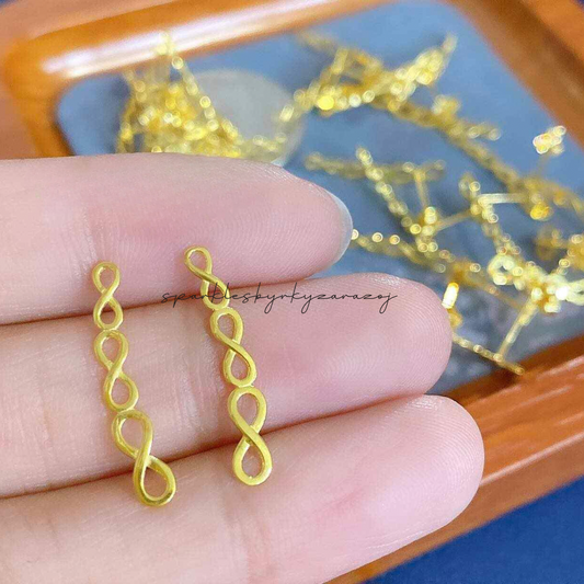 Triple Infinity solid earrings 18k saudi gold